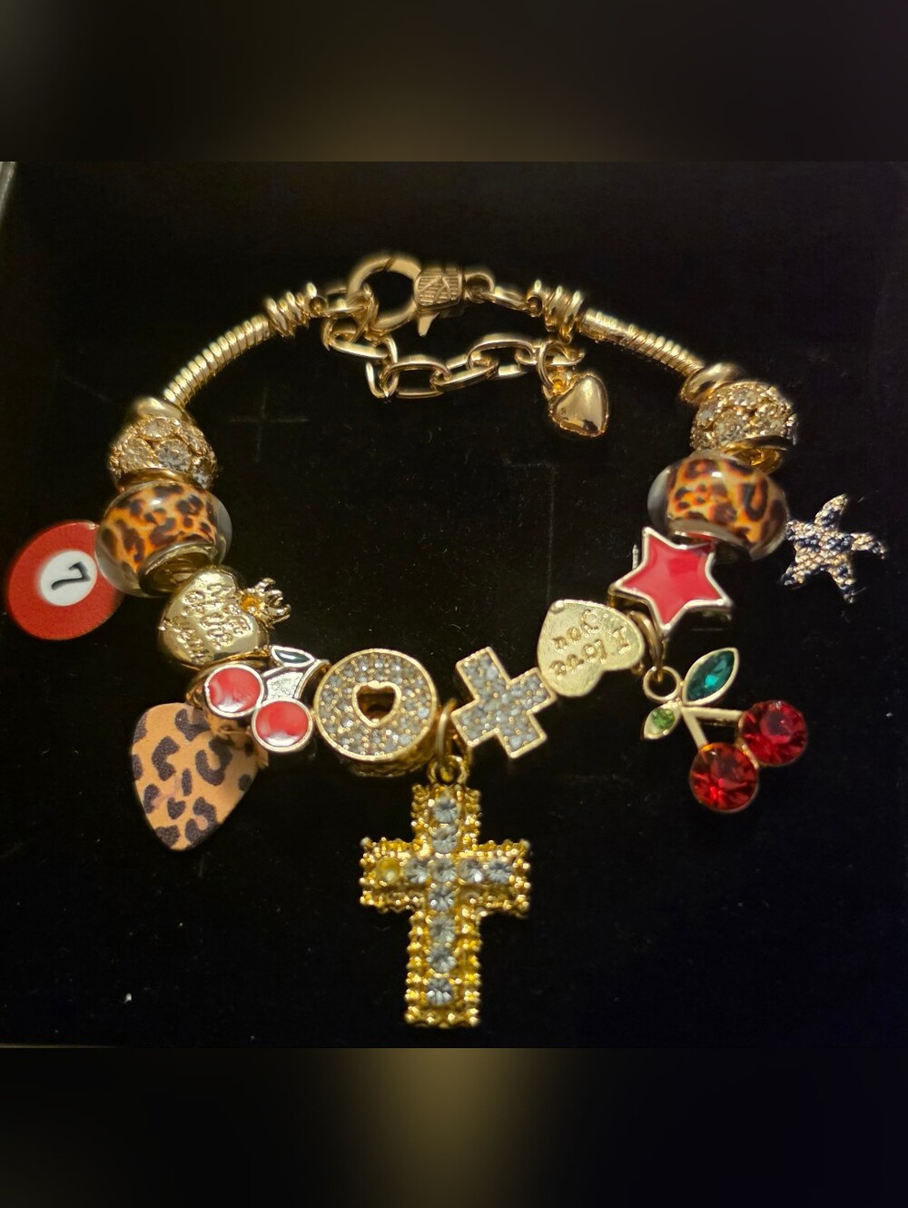 Gold-Tone Charm Bracelet with Crystal Cross and Red Accents